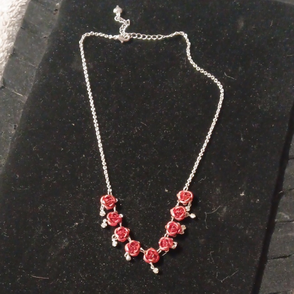Elegant Silver Necklace with Red Rose Accents